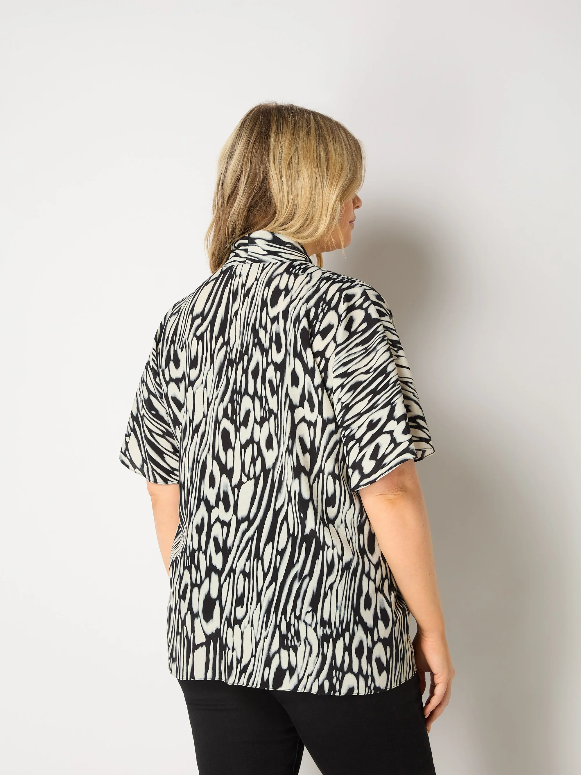 Abstract Leopard V-Neck Blouse - Image 6