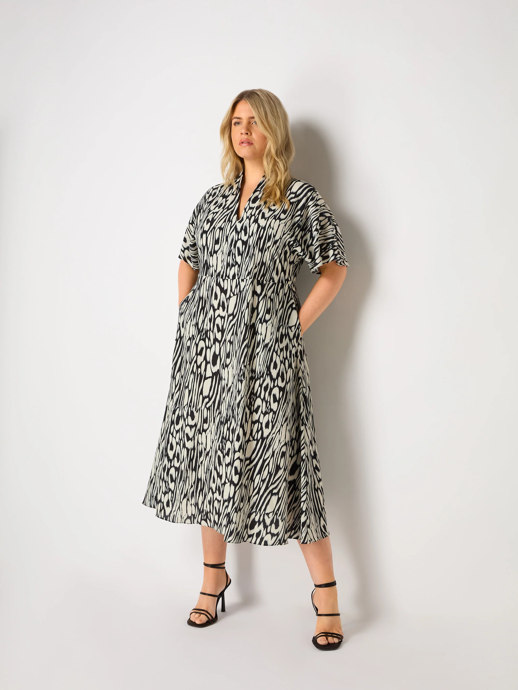 Abstract Leopard V-Neck Midi Dress - Image 4