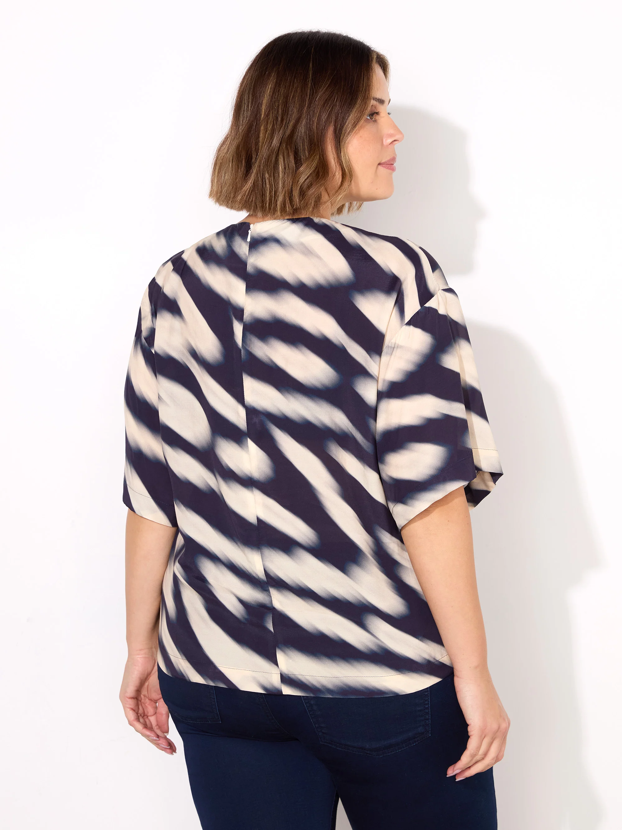 Blurred Animal Print Elevated Woven Top - Image 4