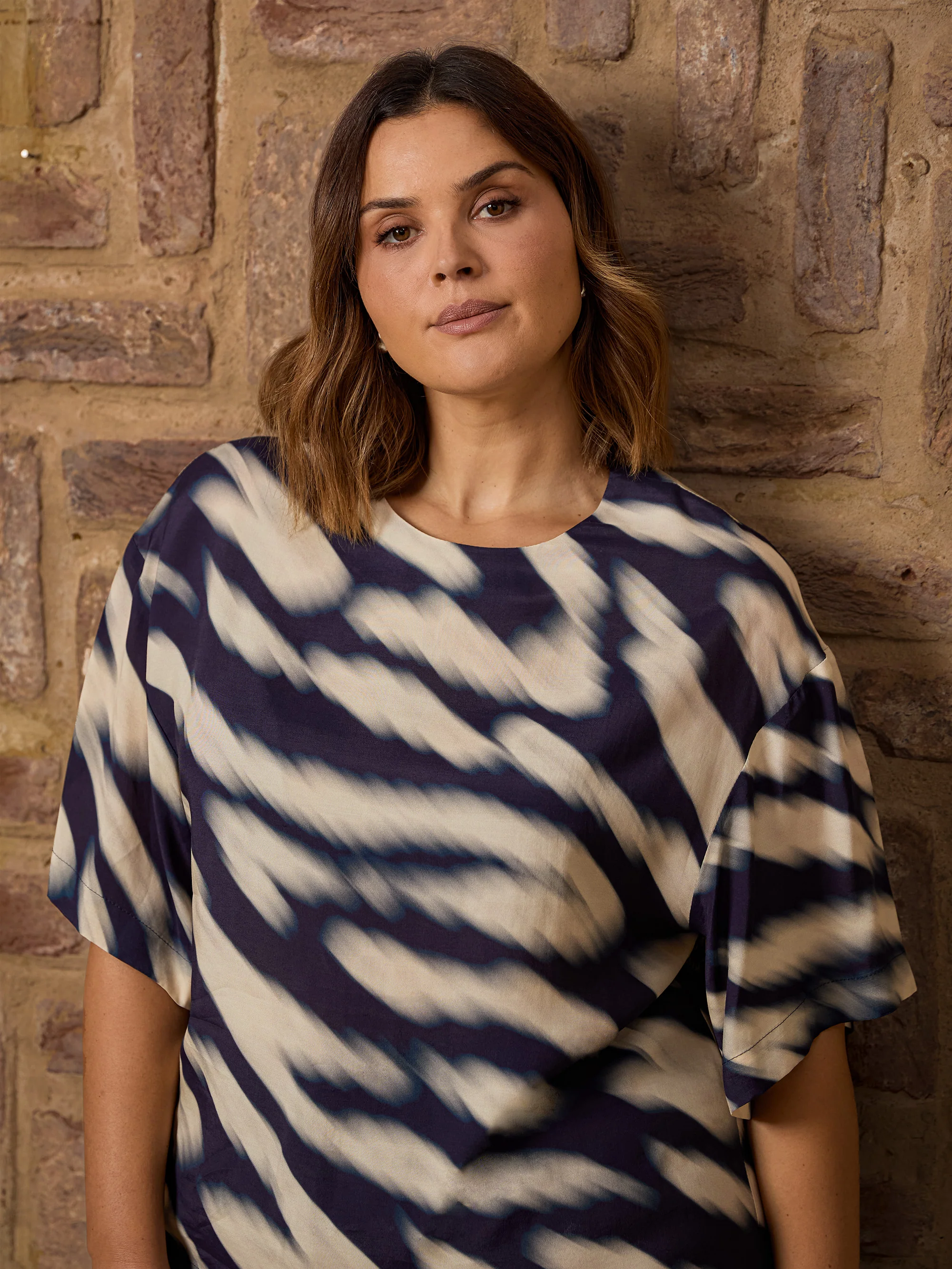Blurred Animal Print Elevated Woven Top - Image 5